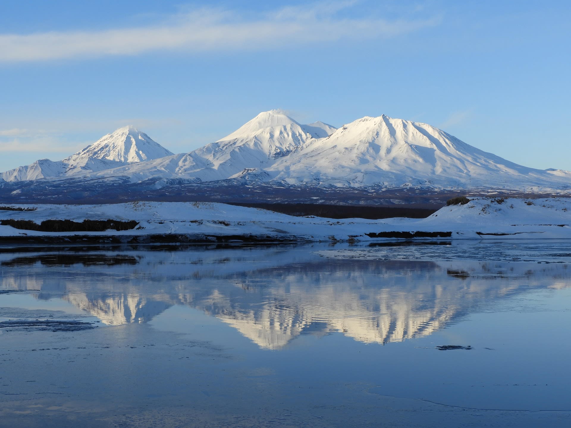 Active volcano and steaming geysers in Kamchatka Peninsula, Russia