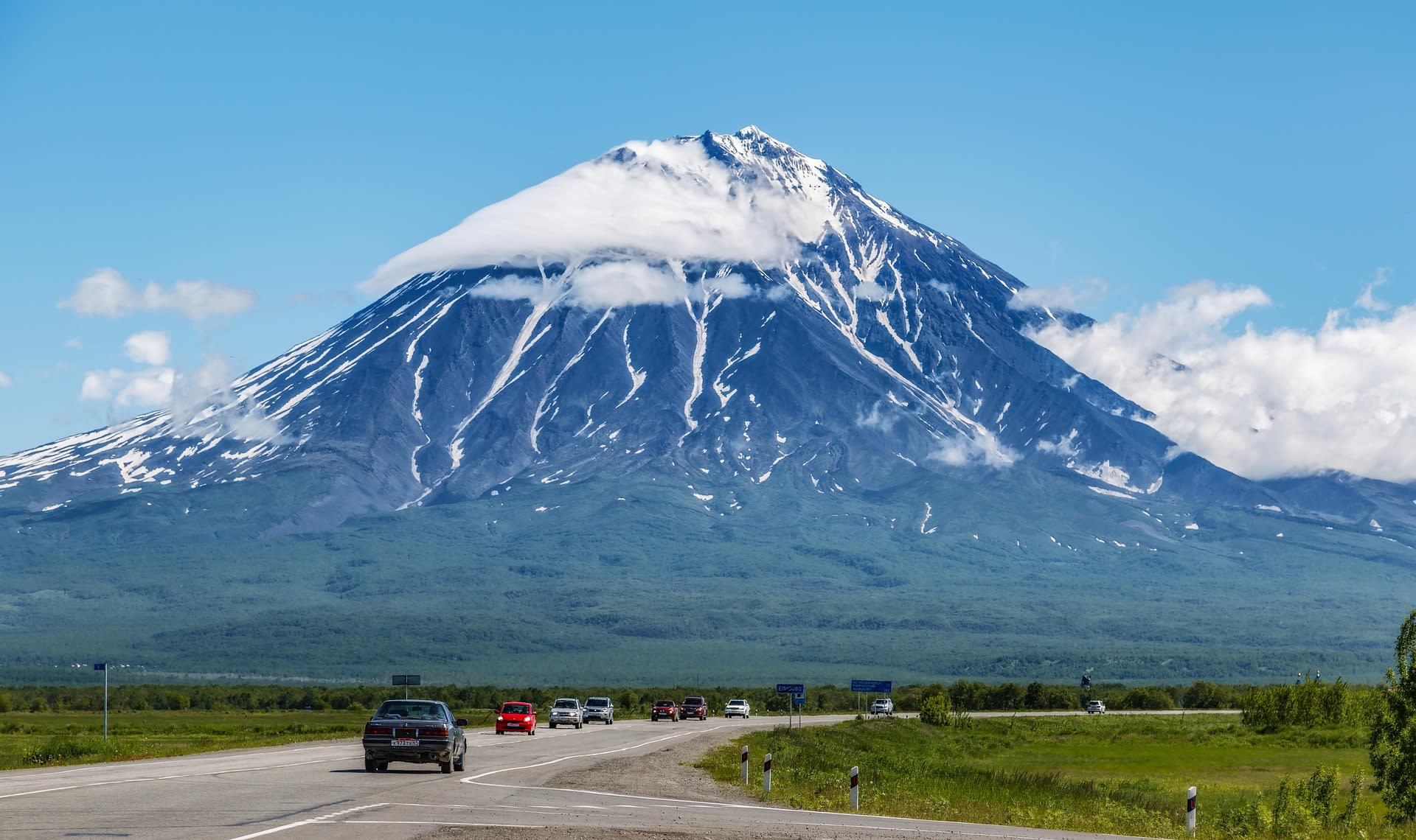 Steaming fumaroles and volcanic landscape in Kamchatka, Russia