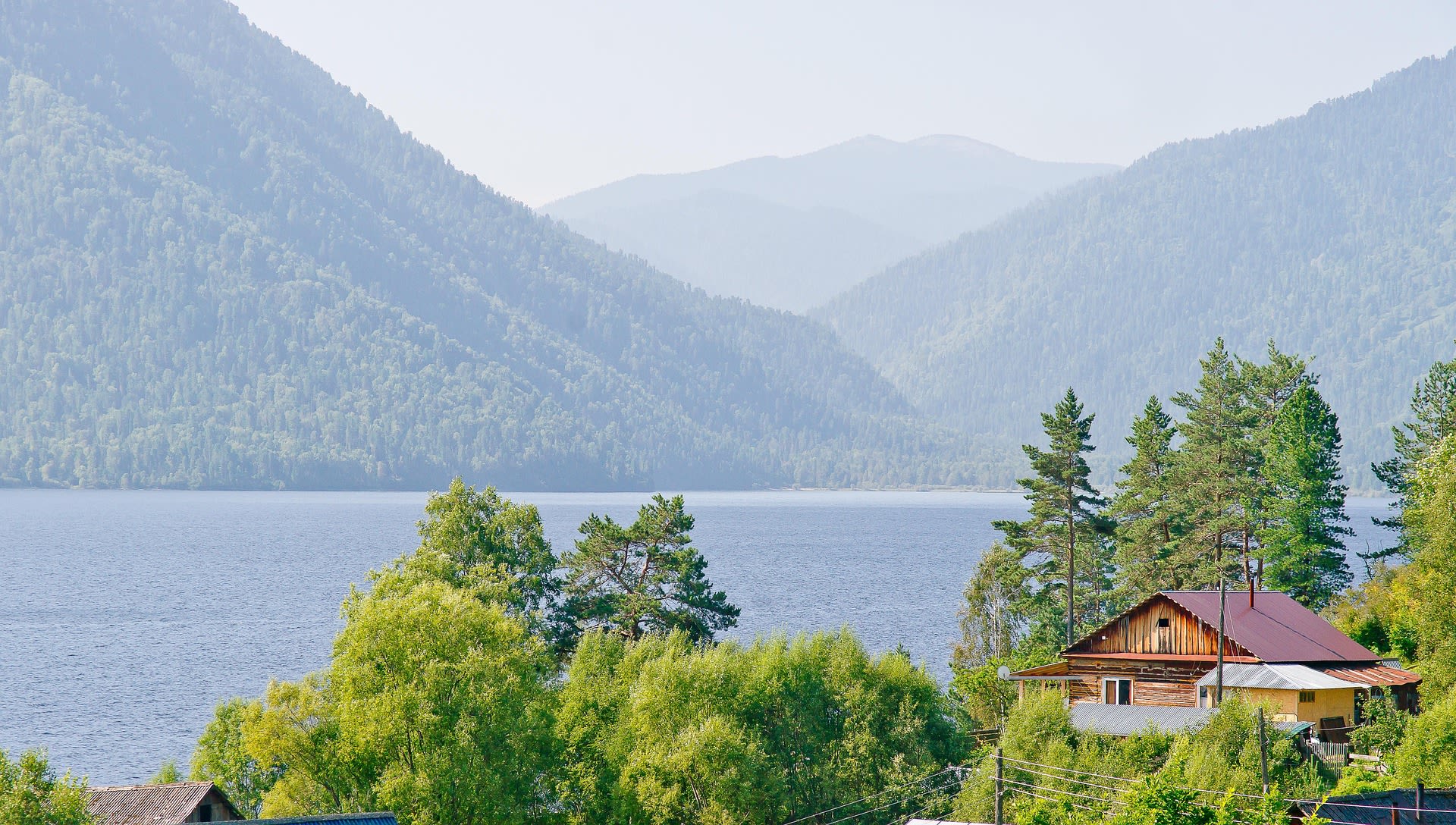 Small lakeside town of Artybash at the northern shore of Lake Teletskoye, Russia