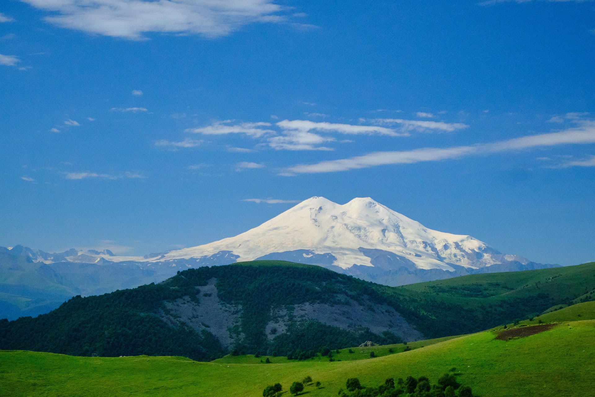 Dramatic sky above the snow slopes of Mount Elbrus in the Russian Caucasus