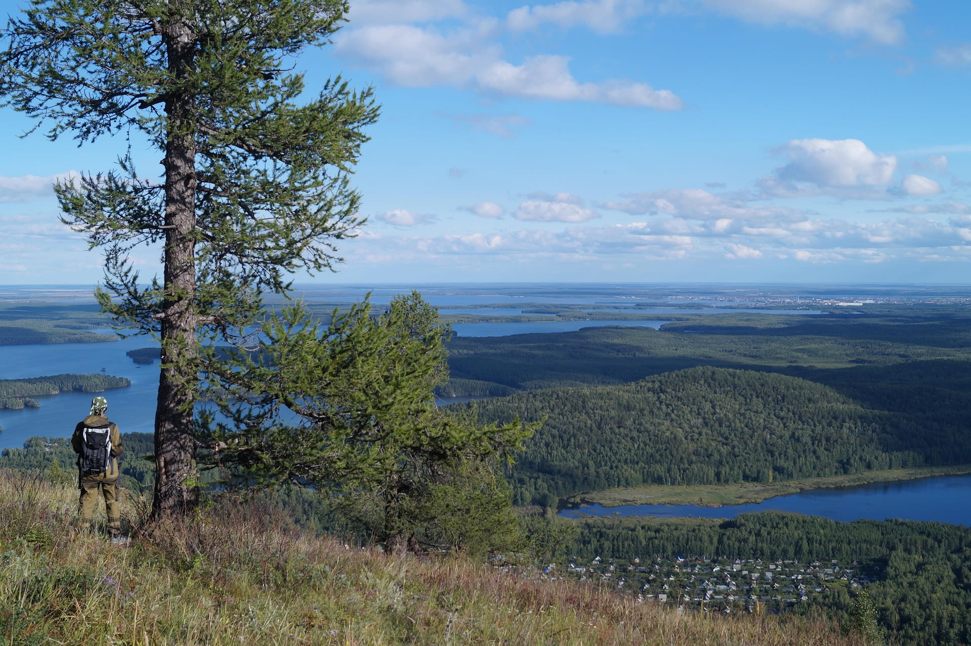 Rocky summit and taiga forest on the ridgeline of the Northern Urals, Russia