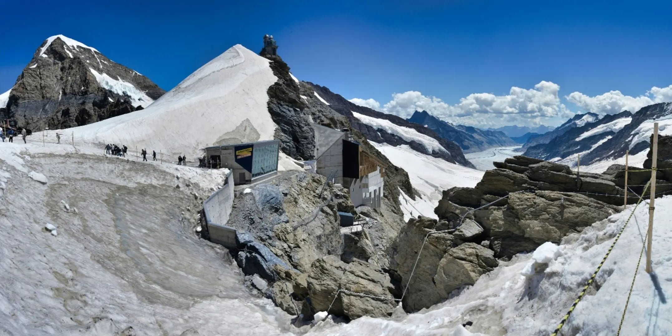 snowy mountains viewed from above with people, Jungfraujoch