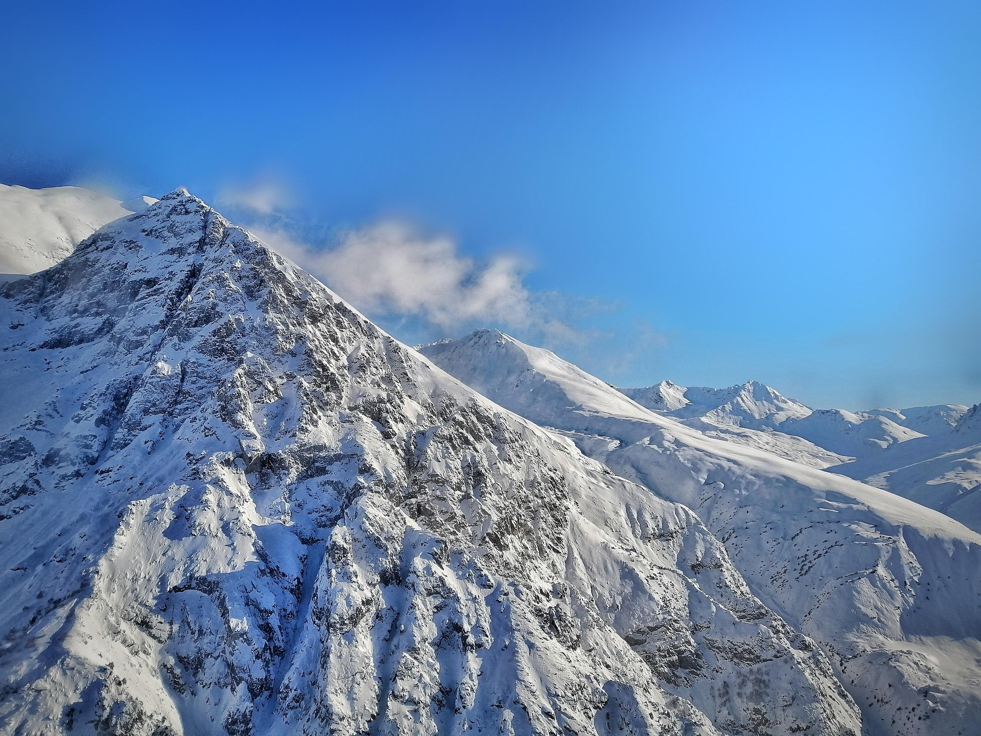 Rugged Karakoram ridgelines and snowy peaks surrounding K2 base camp, Pakistan