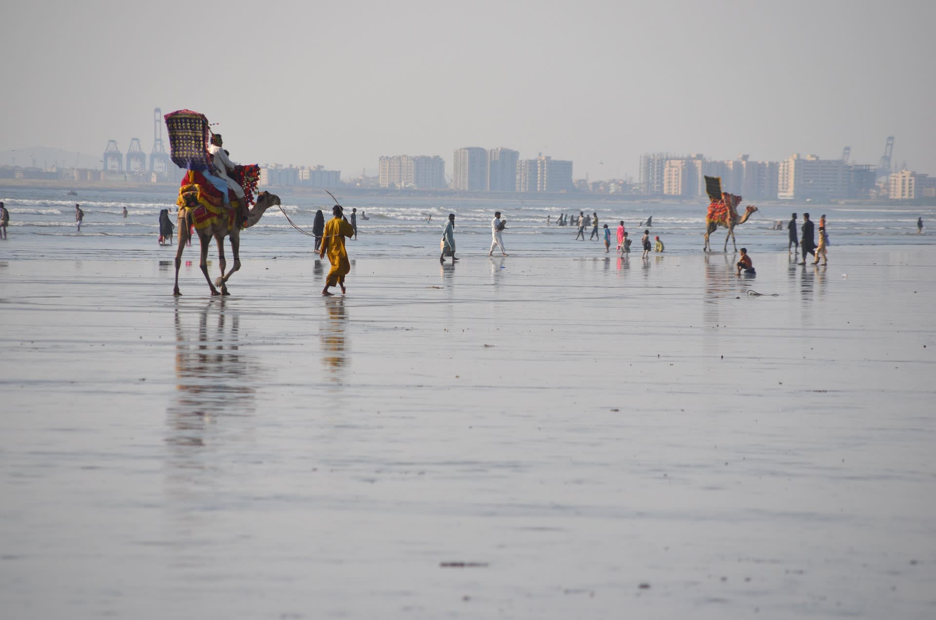 Sandy shoreline and Arabian Sea waves at Karachi Beach, Pakistan