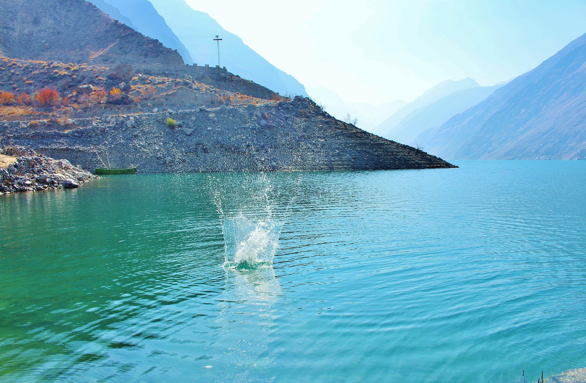 Clear blue waters of Lake Satpara reflecting the mountains near Skardu, Pakistan