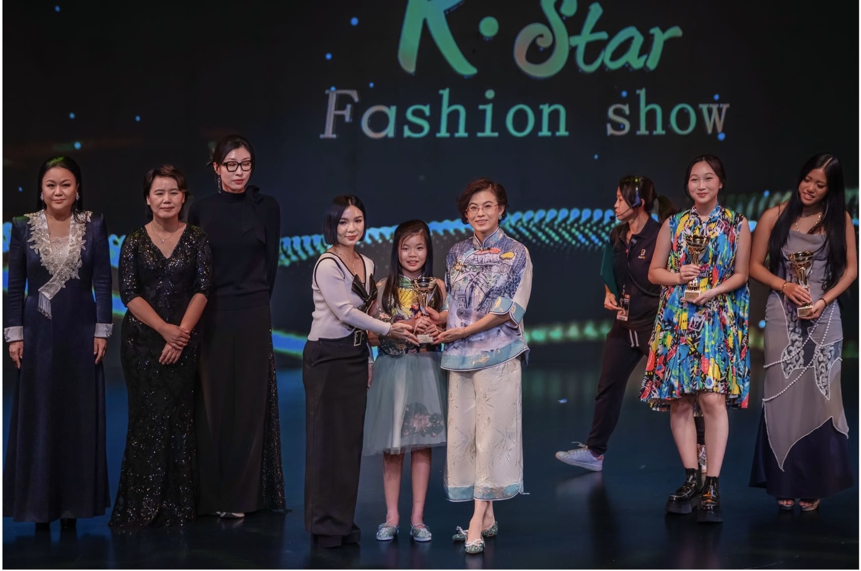 Rebecca: Outstanding Fashion Designer Award