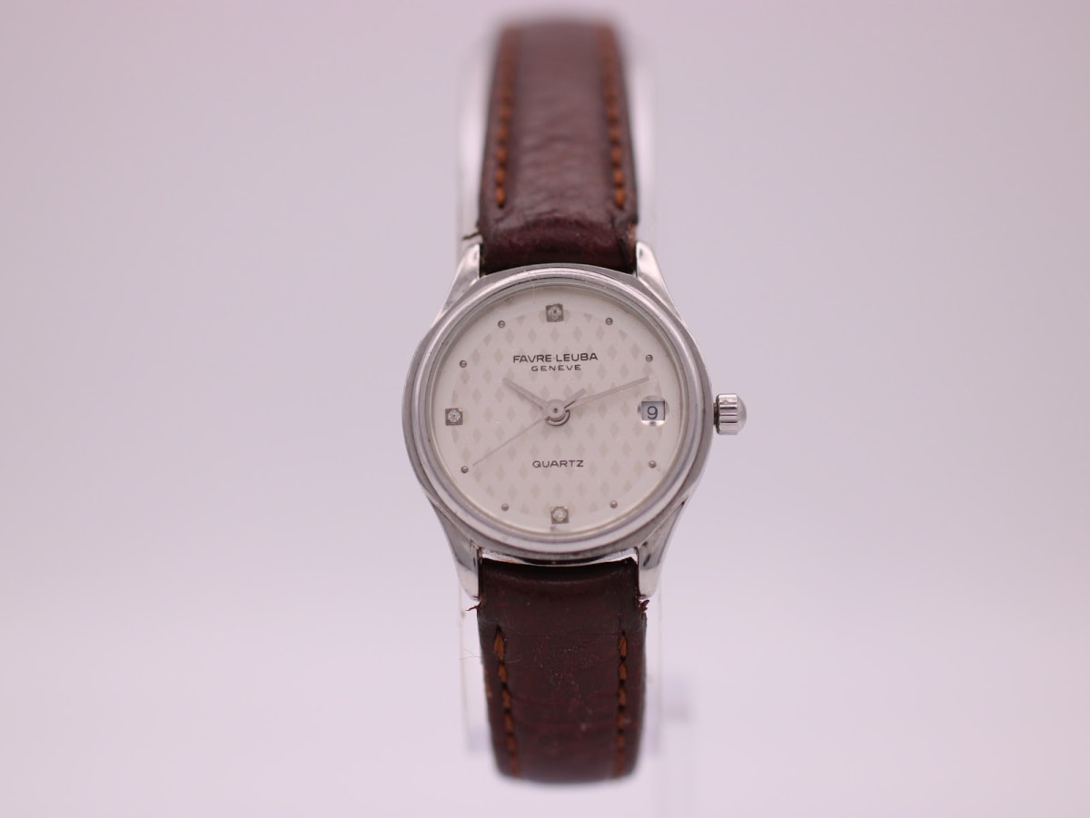 Front view of the Favre Leuba 24G0-42 quartz watch with a cream dial, silver case, and brown leather strap.