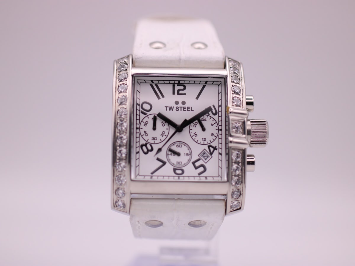 Front view of TW Steel TW 118 chronograph with white dial, bold numerals, and diamond-set rectangular case.