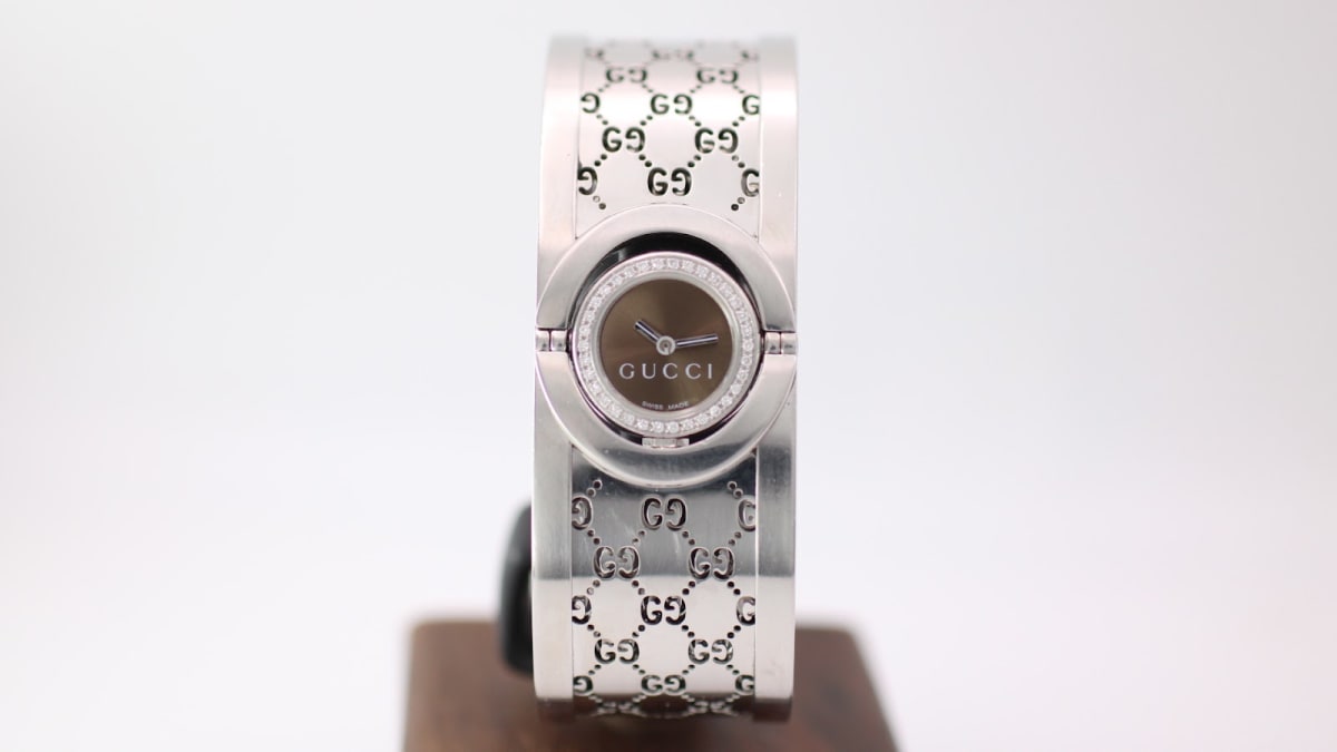 Gucci T.1.2 watch with brown dial and silver case, 2000s