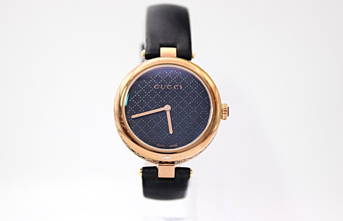 Gucci 141.4 watch with black dial and rose gold case, 2010s