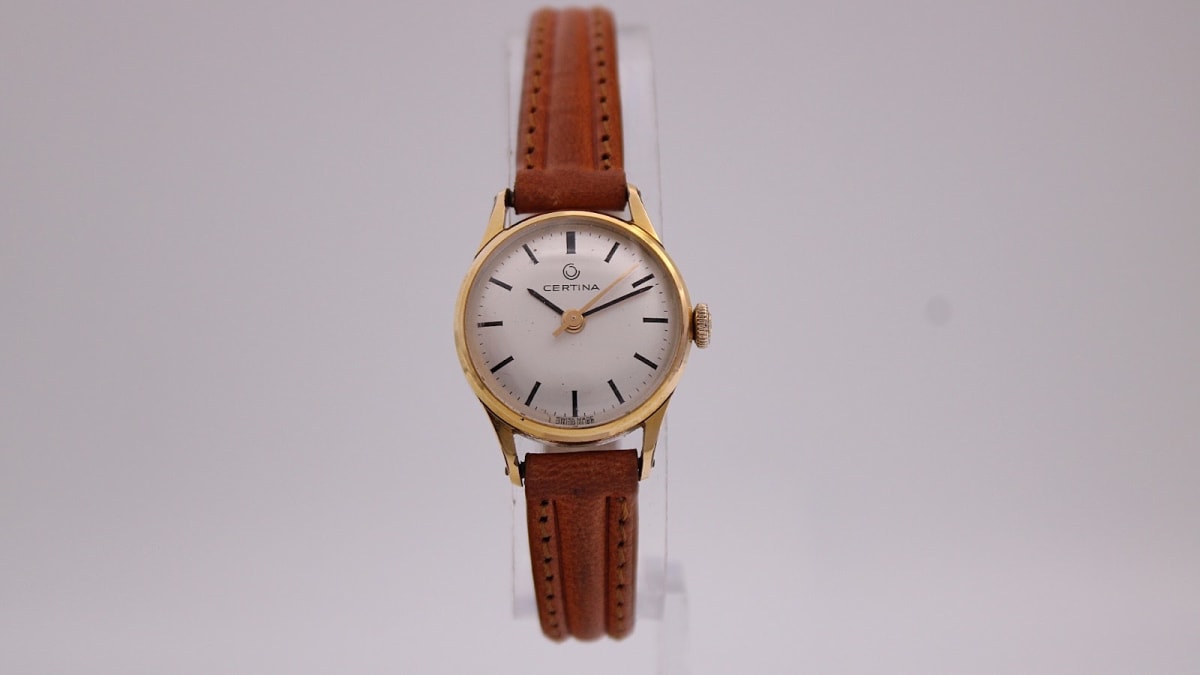 Certina watch with silver dial and gold case, 1970