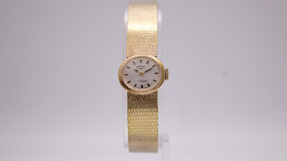 Rotary watch with silver dial and gold case, circa 1970s