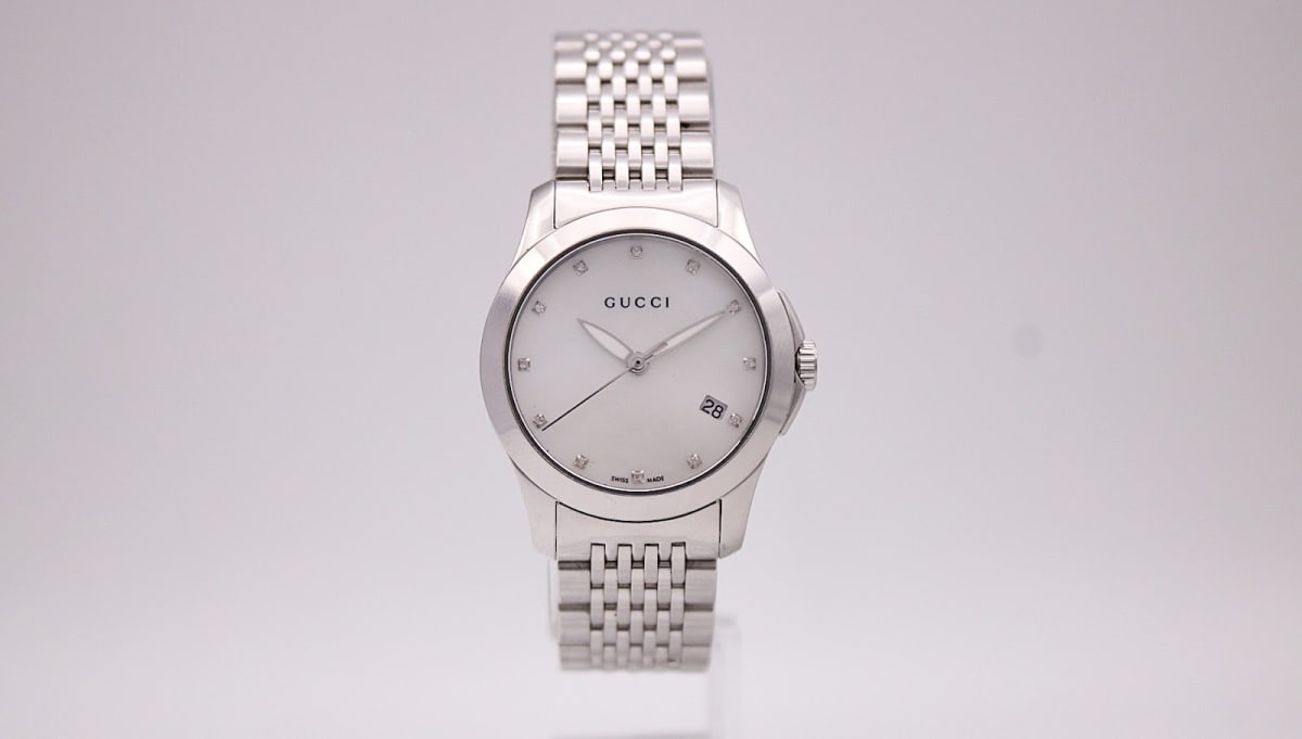 Gucci 126.5 watch with white dial and silver case, 2010s