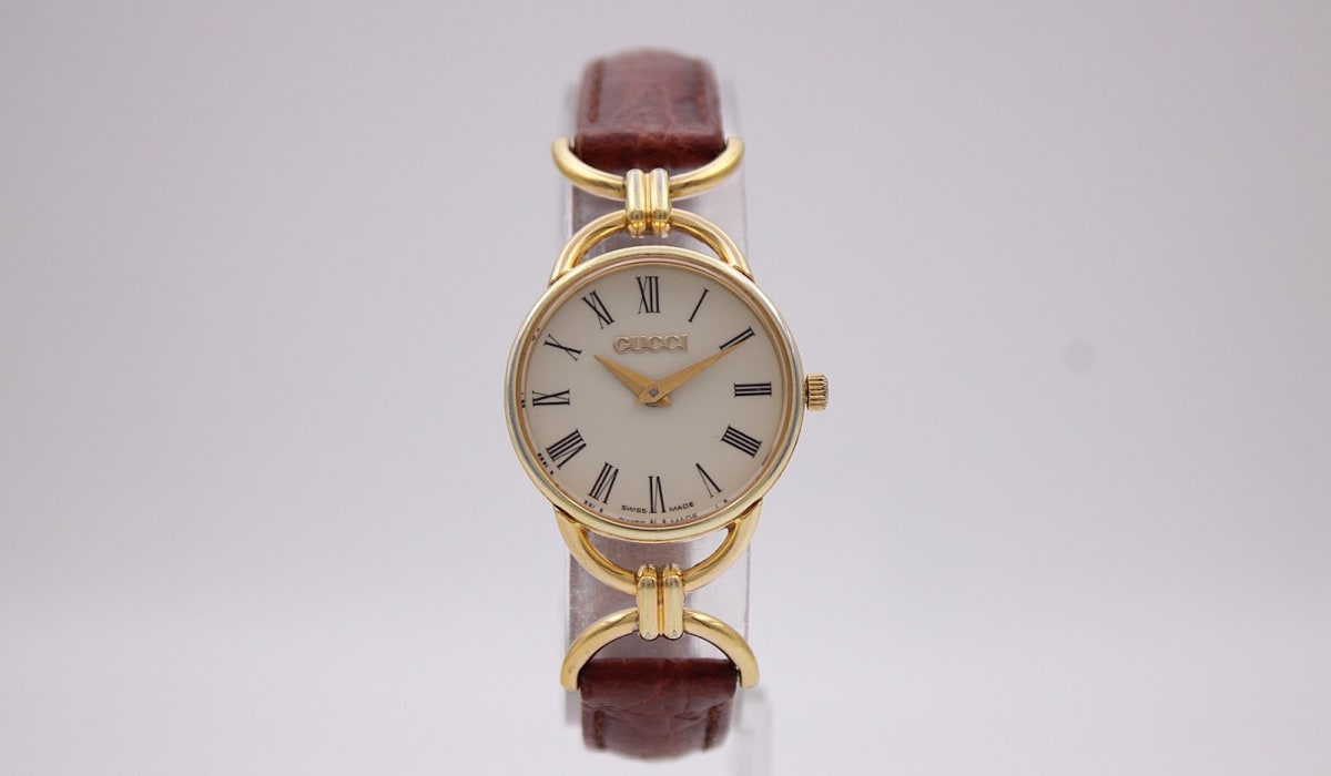 Gucci 6000.2.L watch with cream dial and gold case, 1990s