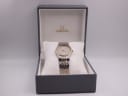 The Omega De Ville watch presented in its original grey Omega presentation box.
