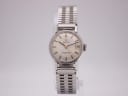 Front view of vintage Omega Ladymatic automatic watch with cream dial and silver stainless steel case.