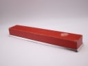 Exterior view of the generic red 'UNO' presentation box for the watch, showing its rectangular shape.