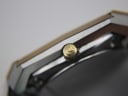 Close-up of the signed gold-tone crown of the Rado Diastar watch.
