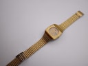 Top-down view of the Rado Diastar watch with its integrated two-tone steel bracelet.