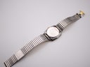 Back view of the Rado Diastar, showing the stainless steel case back and bracelet.