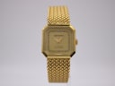 Front view of Santima gold octagonal watch with champagne dial and mesh bracelet.