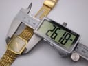 Digital caliper measuring the Santima watch case, displaying an exact diameter of 26.18 mm.