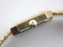 Close-up of the Santima watch crown, intricately designed with a prominent 'S' logo.
