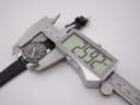 Digital caliper measuring the CASWATCH watch case diameter, displaying 29.92mm.