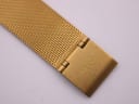 Close-up of the fold-over clasp on the mesh bracelet, showing the 'TOY WATCH' logo engraving.