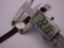 Another angle of the digital caliper measuring the Favre Leuba watch case, confirming the 22.19mm reading.