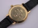 Detailed close-up of the Raymond Weil case back, clearly engraved with 'RAYMOND WEIL', '18K GOLD ELECTROPLATED', '10', and model '5827', showing surface scratches.