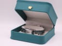 The Tissot T042109 A watch presented inside its original teal Tissot branded box.