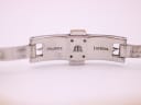 Interior view of the hidden butterfly clasp, clearly showing the "Maurice Lacroix" signature and logo engraved on the stainless steel.