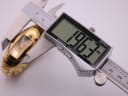 Digital caliper measuring the case diameter of the Maurice Lacroix watch, displaying a precise measurement of 19.63mm.