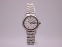 Front view of the SEIKO 2906-0020 ladies' automatic watch with a white dial, day-date complication, and stainless steel bracelet.