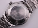 Detailed close-up of the stainless steel case back of the SEIKO 2906-0020, displaying model number, serial number, and 'WATER RESIST'.
