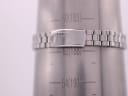 The SEIKO stainless steel bracelet with its signed "SEIKO" clasp on a wrist sizing gauge, indicating a maximum wrist circumference of 188mm.