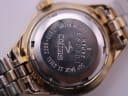 Close-up of the stainless steel case back, engraved with 'SEIKO WATER RESIST SGP BACK ST. STEEL 2206-0090 1D1098 JAPAN B'.