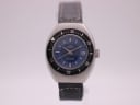 Unto watch with blue dial and silver case, 1970s