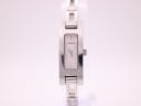 Front view of the Gucci 3900L watch showing the silver rectangular dial with sunburst texture and 'GUCCI' logo.