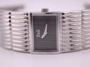 Close-up front view of the D&G watch dial, showing the grey vertical stripe texture and D&G logo.