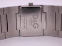Close-up of the watch case back, showing 'D&G Time', '3 ATM Water Resistant', and 'All Stainless Steel' engravings.