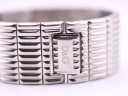 Close-up of the integrated bracelet's hidden deployment clasp, showing the D&G logo.