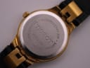 Detailed close-up of the stainless steel case back, showing 'TISSOT', 'WATERRESISTANT 30M', 'SAPPHIRE CRYSTAL', and model number V135/235.
