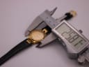 Digital caliper measuring the watch case diameter at 26.8mm, confirming the size.