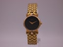 Front view of the vintage Gucci 3400 L watch with a gold-tone case and bracelet, featuring a black dial and gold hands.