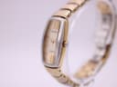 Side view of the Seiko Vivace watch showing the gold-tone crown and the two-tone case and bracelet details.