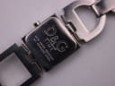 Close-up view of the D&G Time watch case back, engraved with "DOLCE&GABBANA® TIME", "3ATM WATER RESISTANT", and "ALL STAINLESS STEEL".