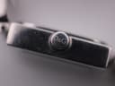 Side close-up of the watch crown, engraved with the D&G logo.
