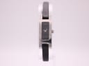 Gucci 3900L watch with black dial and silver case, late 1980s